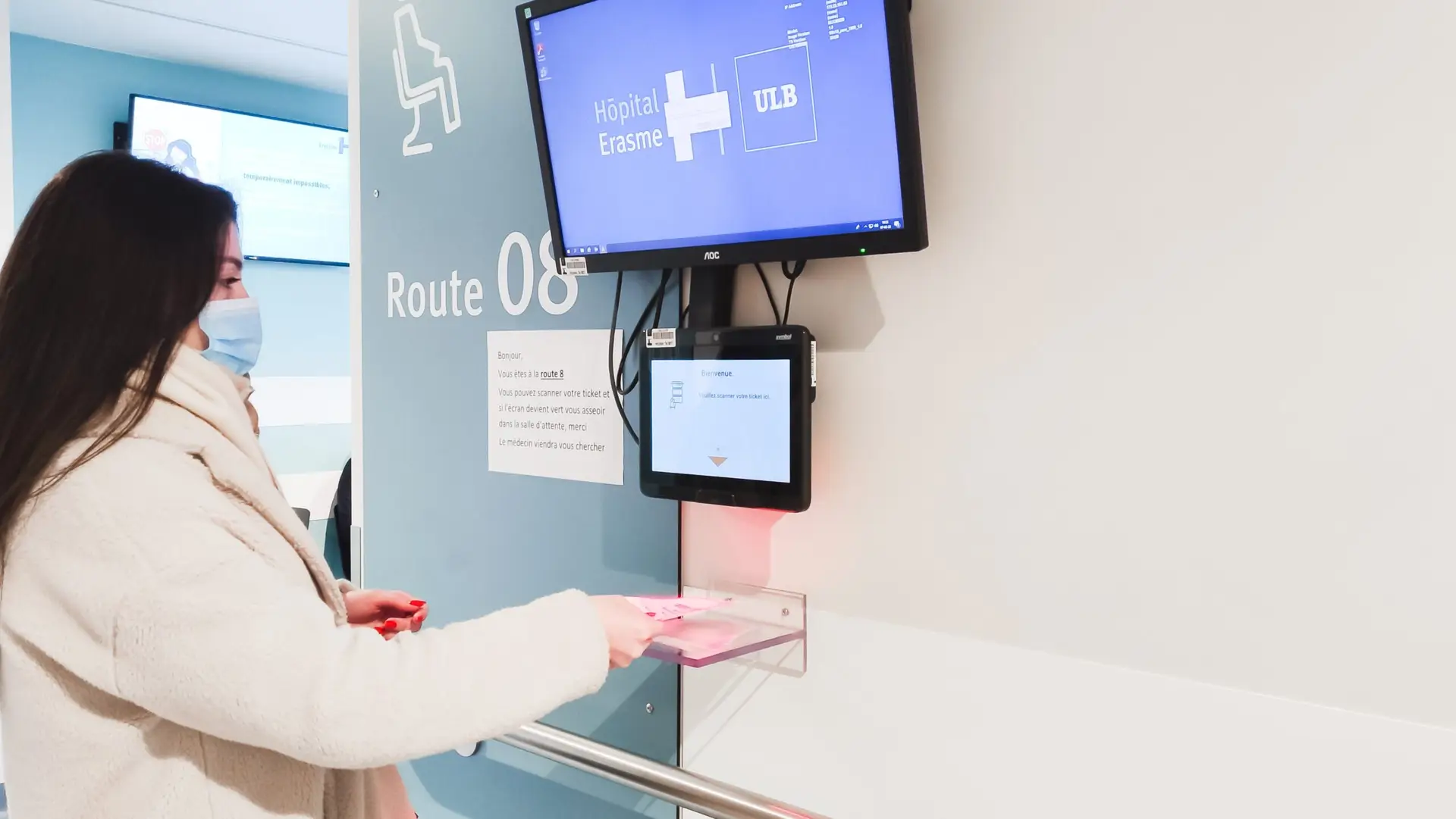 Clinic reception area with token number display screen for patients